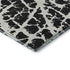 9' X 12' Black And Ivory Abstract Washable Area Rug With UV Protection