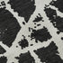 9' X 12' Black And Ivory Abstract Washable Area Rug With UV Protection