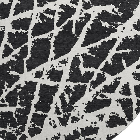 9' X 12' Black And Ivory Abstract Washable Area Rug With UV Protection