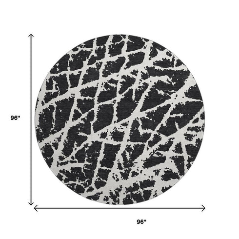 9' X 12' Black And Ivory Abstract Washable Area Rug With UV Protection