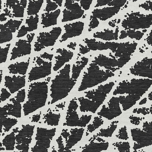 9' X 12' Black And Ivory Abstract Washable Area Rug With UV Protection