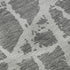 9' X 12' Charcoal And Ivory Abstract Washable Area Rug With UV Protection