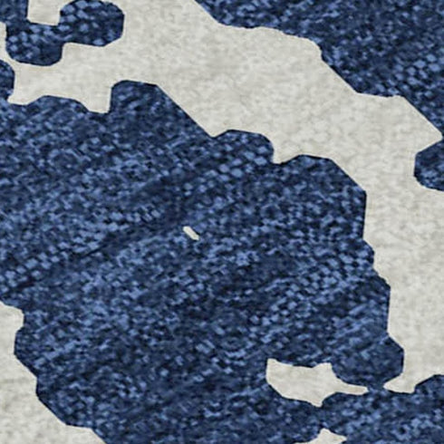 9' X 12' Navy Blue And Ivory Abstract Washable Area Rug With UV Protection