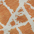 9' X 12' Orange And Ivory Abstract Washable Area Rug With UV Protection