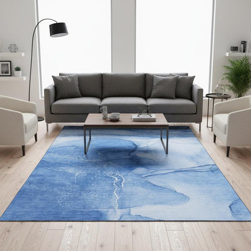 5' X 8' Blue And Ivory Abstract Washable Area Rug With UV Protection