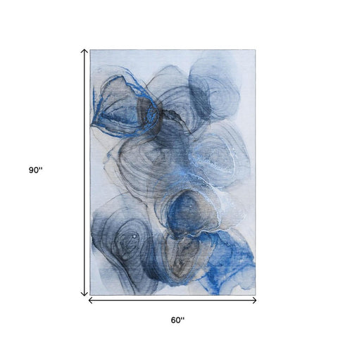 5' X 8' Navy Blue And Ivory Abstract Washable Area Rug With UV Protection