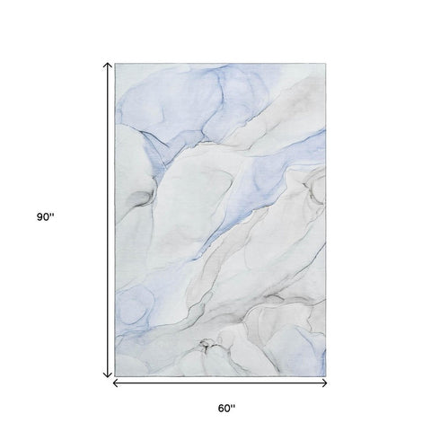 5' X 8' Blue And Ivory Abstract Washable Area Rug With UV Protection