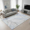 5' X 8' Blue And Ivory Abstract Washable Area Rug With UV Protection