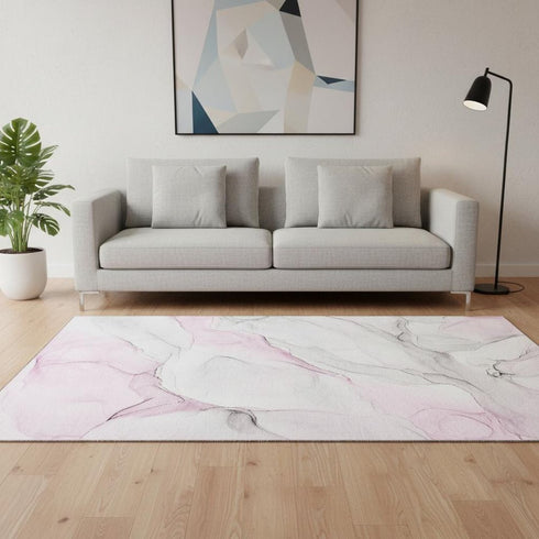 5' X 8' Pink And Ivory Abstract Washable Area Rug With UV Protection