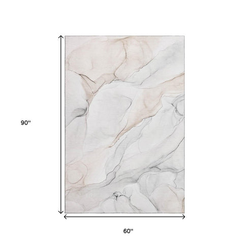 5' X 8' Ivory And Beige Abstract Washable Area Rug With UV Protection