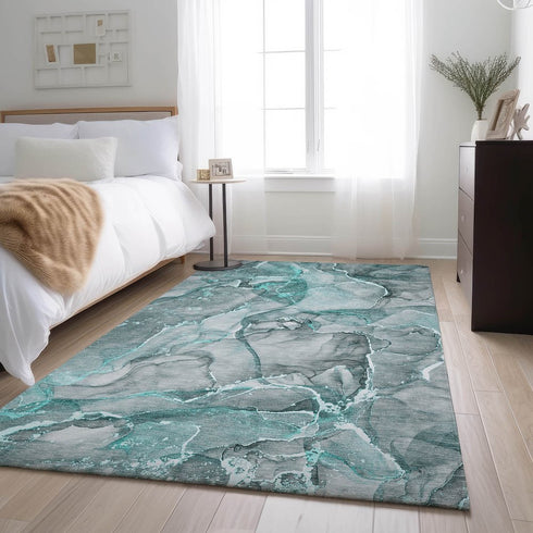 8' X 10' Teal And Ivory Abstract Washable Area Rug With UV Protection
