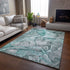 8' X 10' Teal And Ivory Abstract Washable Area Rug With UV Protection