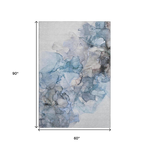 5' X 8' Blue Gray And Ivory Abstract Washable Area Rug With UV Protection