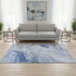 5' X 8' Blue And Ivory Abstract Washable Area Rug With UV Protection