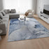 8' X 10' Blue And Ivory Abstract Washable Area Rug With UV Protection
