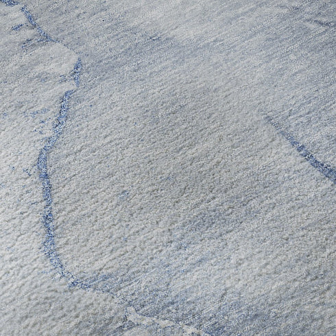 8' X 10' Blue And Ivory Abstract Washable Area Rug With UV Protection