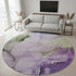 8' Purple Ivory And Green Abstract Washable Round Rug With UV Protection