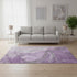 5' X 8' Lilac And Ivory Abstract Washable Area Rug With UV Protection