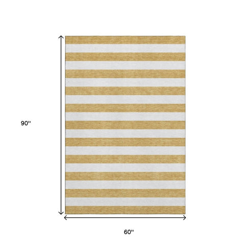 5' X 8' Gold And Ivory Striped Washable Area Rug With UV Protection