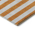 8' X 10' Orange And Ivory Striped Washable Area Rug With UV Protection