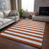 9' X 12' Rust And Ivory Striped Washable Area Rug With UV Protection