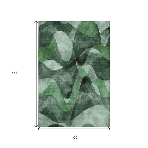 5' X 8' Fern Green Gray And Ivory Abstract Washable Area Rug With UV Protection