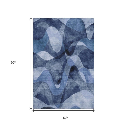 5' X 8' Navy Blue And Ivory Abstract Washable Area Rug With UV Protection