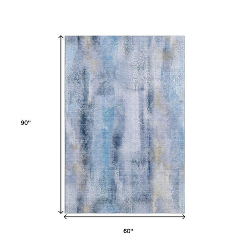 5' X 8' Blue And Ivory Abstract Washable Area Rug With UV Protection