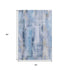 5' X 8' Blue And Ivory Abstract Washable Area Rug With UV Protection