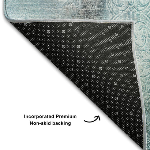 8' X 10' Teal And Ivory Abstract Washable Area Rug With UV Protection