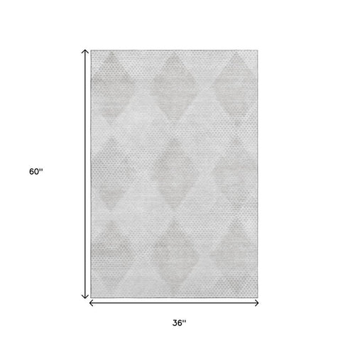 9' X 12' Ivory And Silver Geometric Washable Area Rug With UV Protection