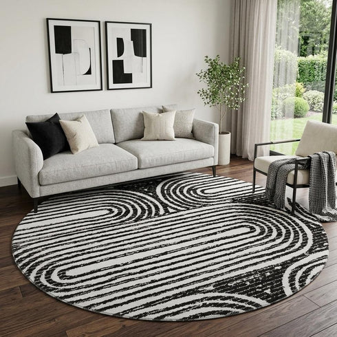 9' X 12' Black And Ivory Geometric Distressed Washable Area Rug With UV Protection