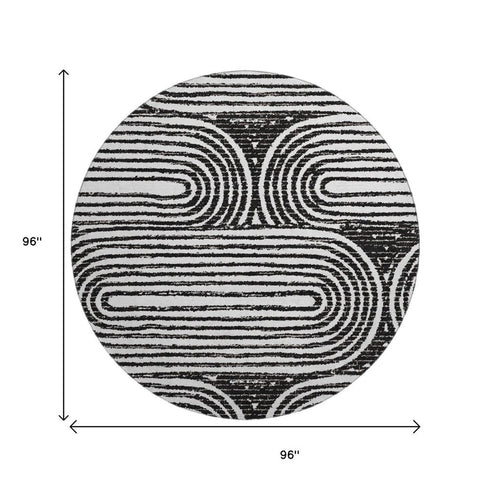 9' X 12' Black And Ivory Geometric Distressed Washable Area Rug With UV Protection