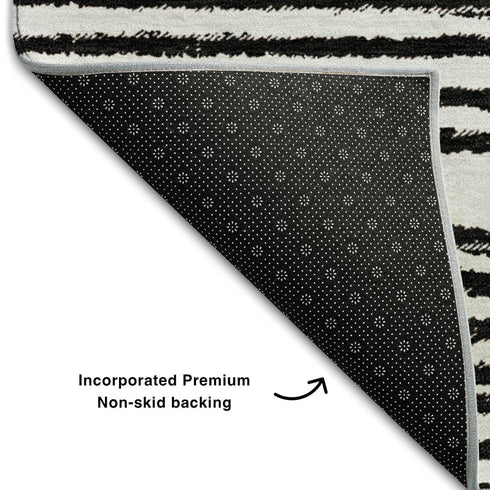 9' X 12' Black And Ivory Geometric Distressed Washable Area Rug With UV Protection