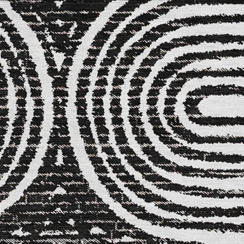 9' X 12' Black And Ivory Geometric Distressed Washable Area Rug With UV Protection