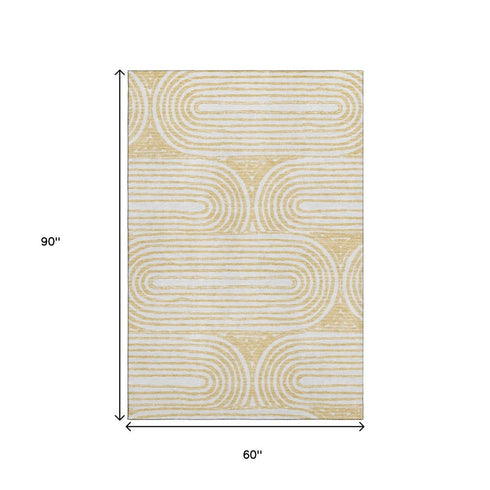 9' X 12' Gold And Ivory Geometric Distressed Washable Area Rug With UV Protection