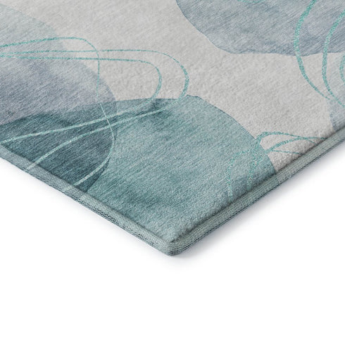 8' X 10' Teal And Ivory Abstract Washable Area Rug With UV Protection