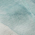 8' X 10' Teal And Ivory Abstract Washable Area Rug With UV Protection