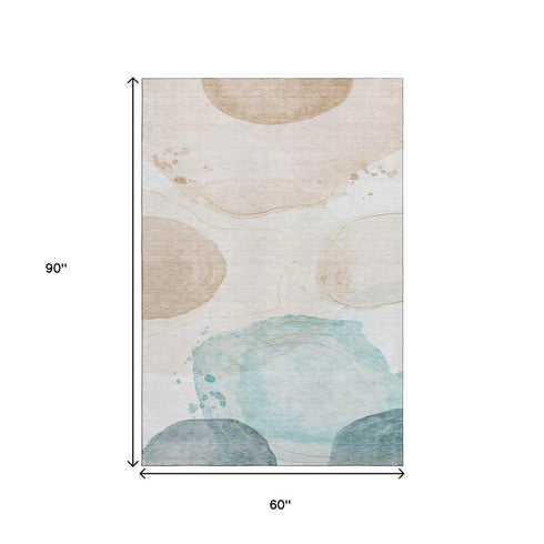 5' X 8' Beige Ivory And Teal Abstract Washable Area Rug With UV Protection