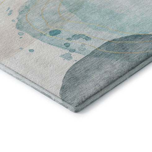 5' X 8' Beige Ivory And Teal Abstract Washable Area Rug With UV Protection