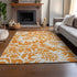 9' X 12' Orange And Ivory Floral Washable Area Rug With UV Protection