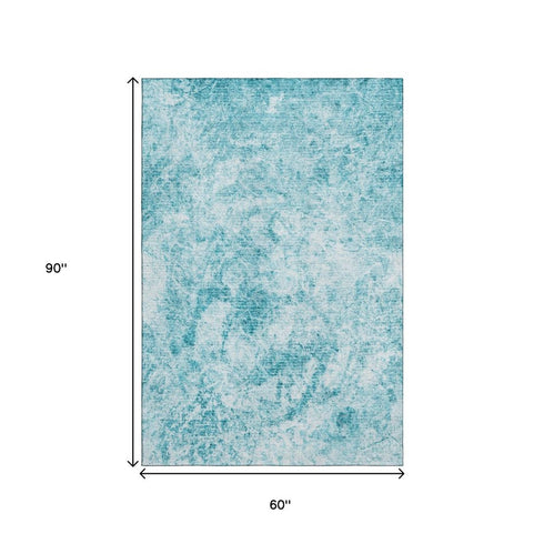 5' X 8' Teal And Ivory Abstract Washable Area Rug With UV Protection