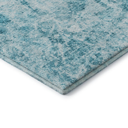 5' X 8' Teal And Ivory Abstract Washable Area Rug With UV Protection