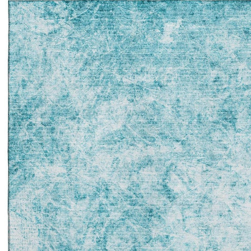 5' X 8' Teal And Ivory Abstract Washable Area Rug With UV Protection