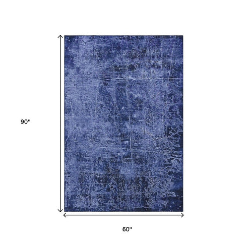 5' X 8' Navy Blue And Ivory Abstract Washable Area Rug With UV Protection