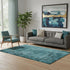 5' X 8' Teal And Ivory Abstract Washable Area Rug With UV Protection