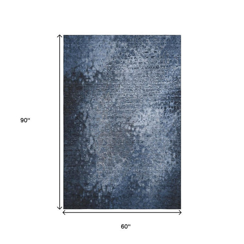 5' X 8' Blue And Ivory Abstract Washable Area Rug With UV Protection