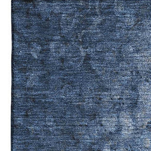 5' X 8' Blue And Ivory Abstract Washable Area Rug With UV Protection