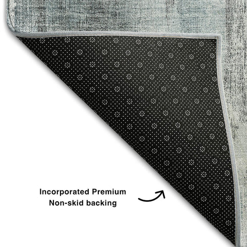 5' X 8' Teal And Ivory Abstract Washable Area Rug With UV Protection