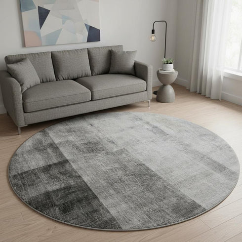 8' Gray And Ivory Abstract Washable Round Rug With UV Protection